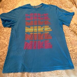 Nike Sportswear T Shirt Mens XL Blue Graphic Standard Fit‎ Retro Grid Logo Tee
